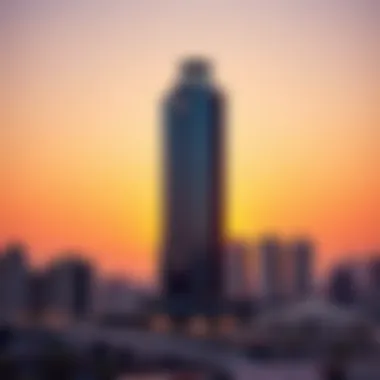 Stunning architectural view of the Damac RBC Tower against a sunset sky